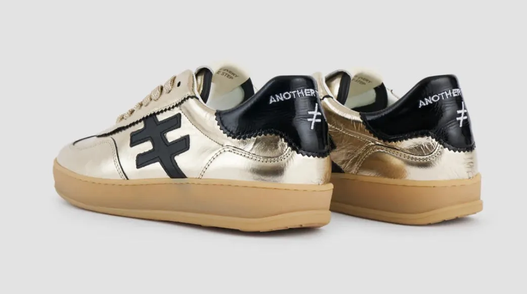 ANOTHER TREND gold and black sneakers